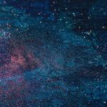 Vibrant abstract artwork evoking a galaxy with blue and pink hues.
